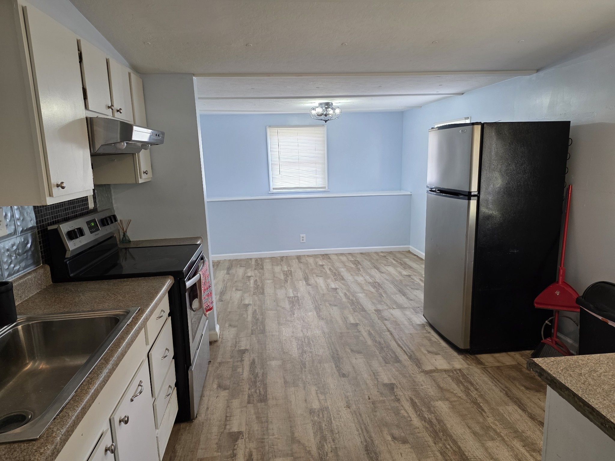 65 Anthony Mill Road Tullahoma, TN 37388 - Photo 26 of 43 a kitchen with a sink appliances and cabinets