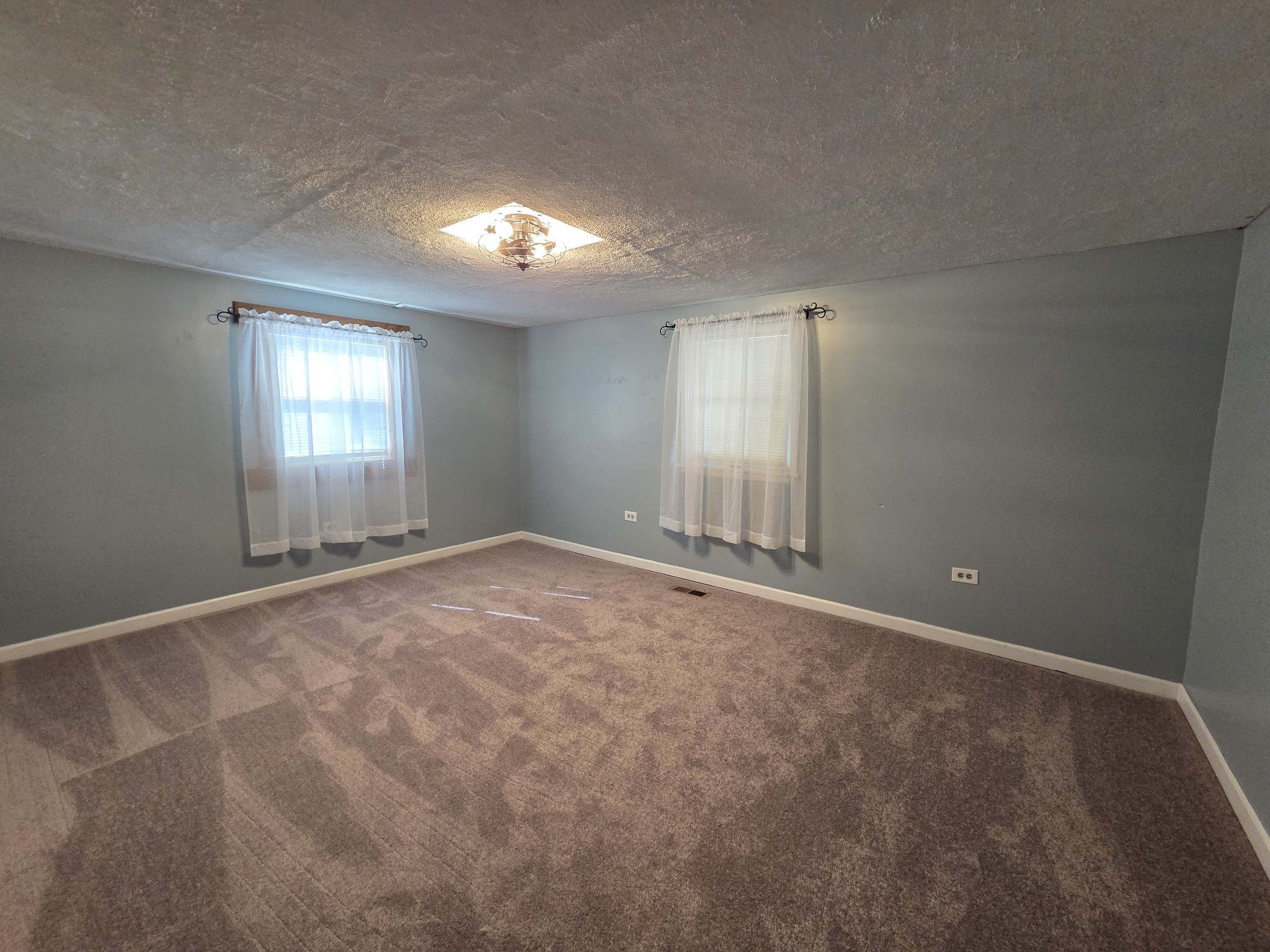 65 Anthony Mill Road Tullahoma, TN 37388 - Photo 29 of 43 an empty room with windows and closet
