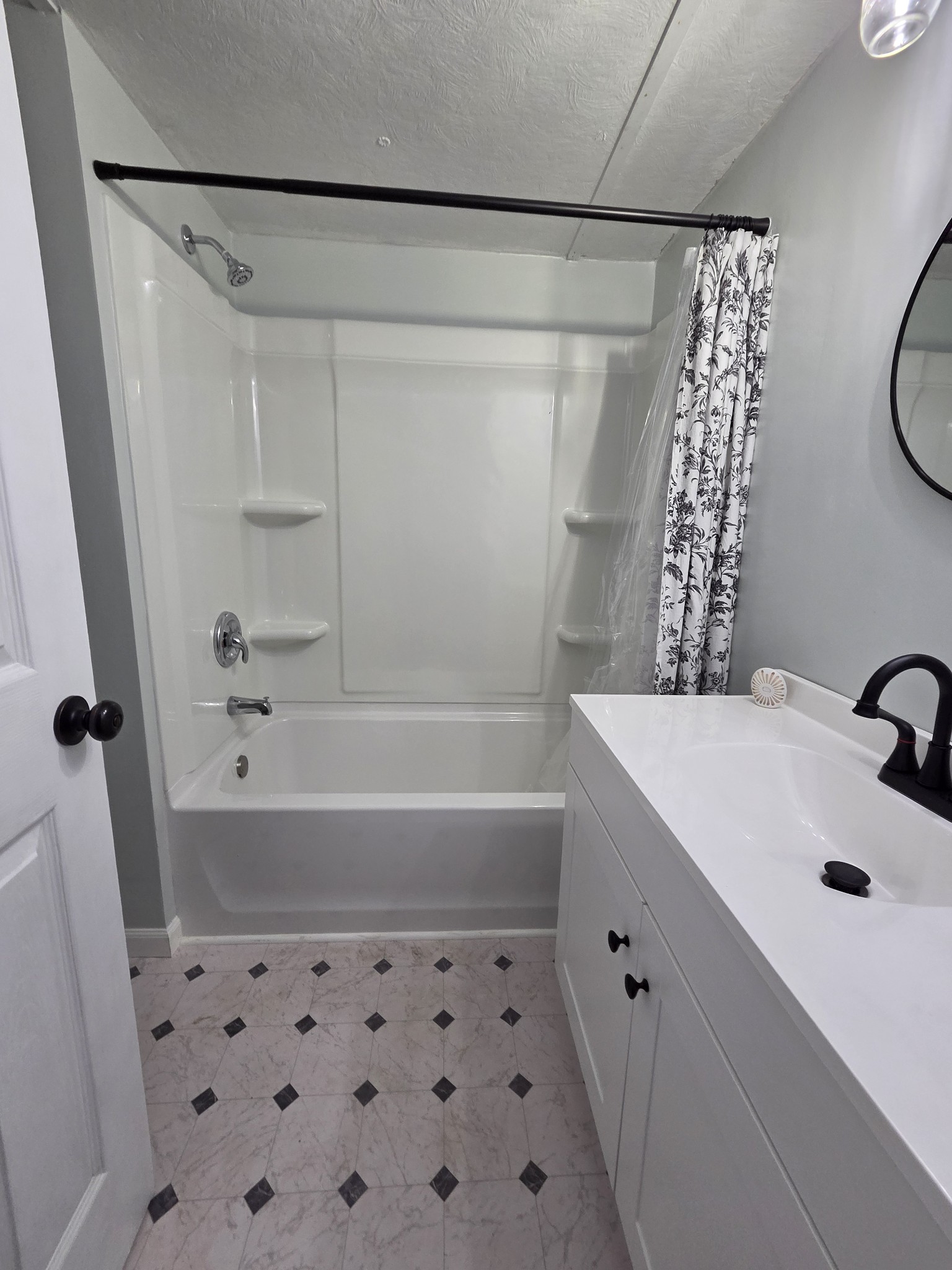 65 Anthony Mill Road Tullahoma, TN 37388 - Photo 32 of 43 a bathroom with a bathtub a sink and a shower