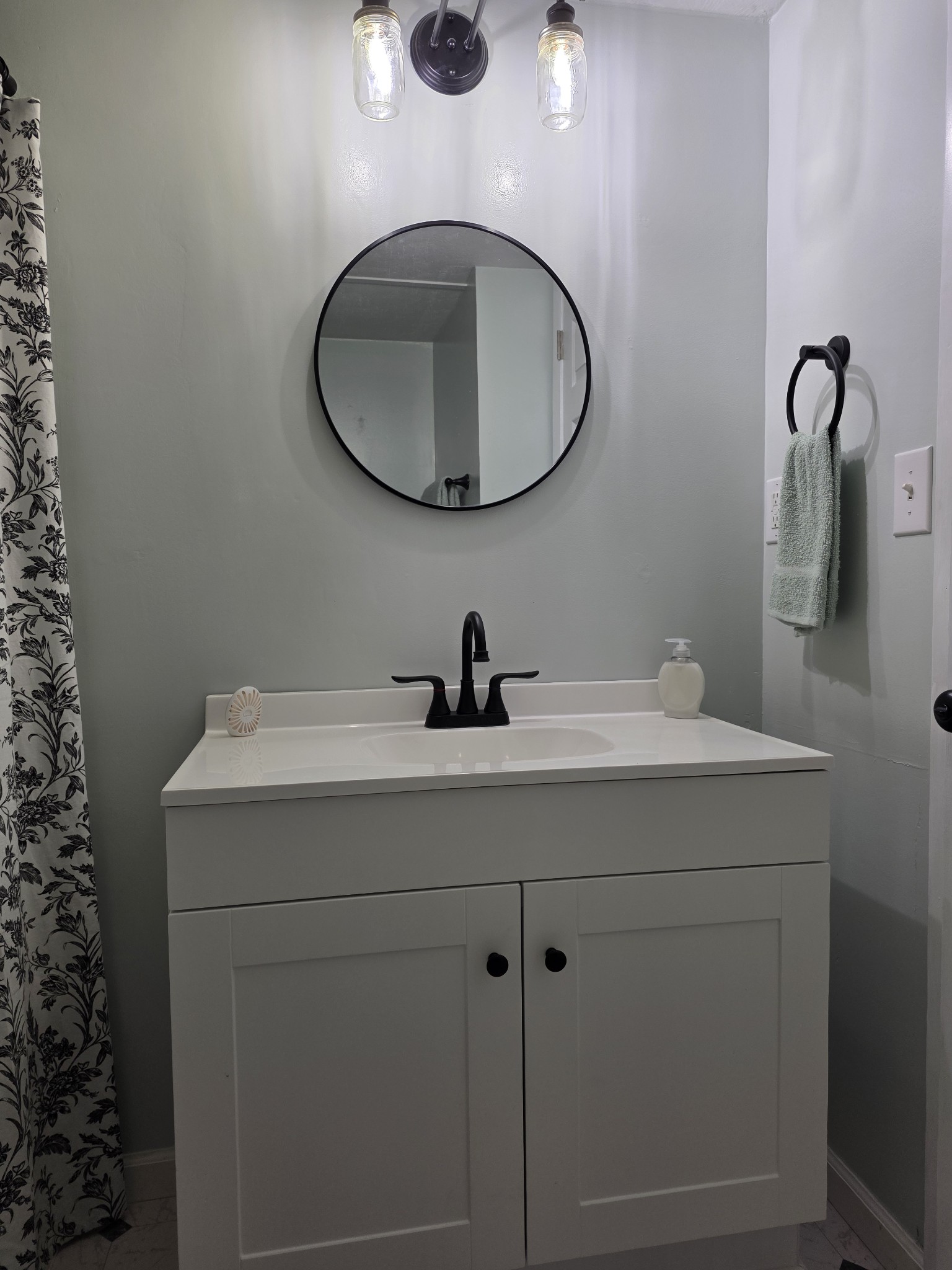 65 Anthony Mill Road Tullahoma, TN 37388 - Photo 34 of 43 a bathroom with a sink and a mirror