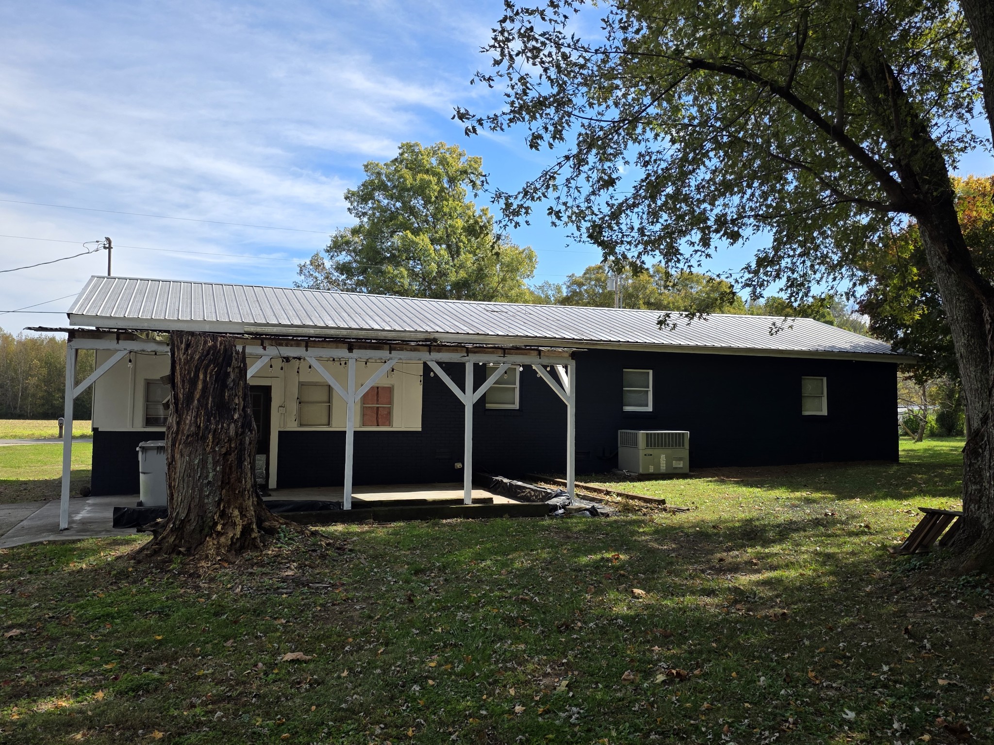 65 Anthony Mill Road Tullahoma, TN 37388 - Photo 7 of 43 a view of a house with a yard and tree