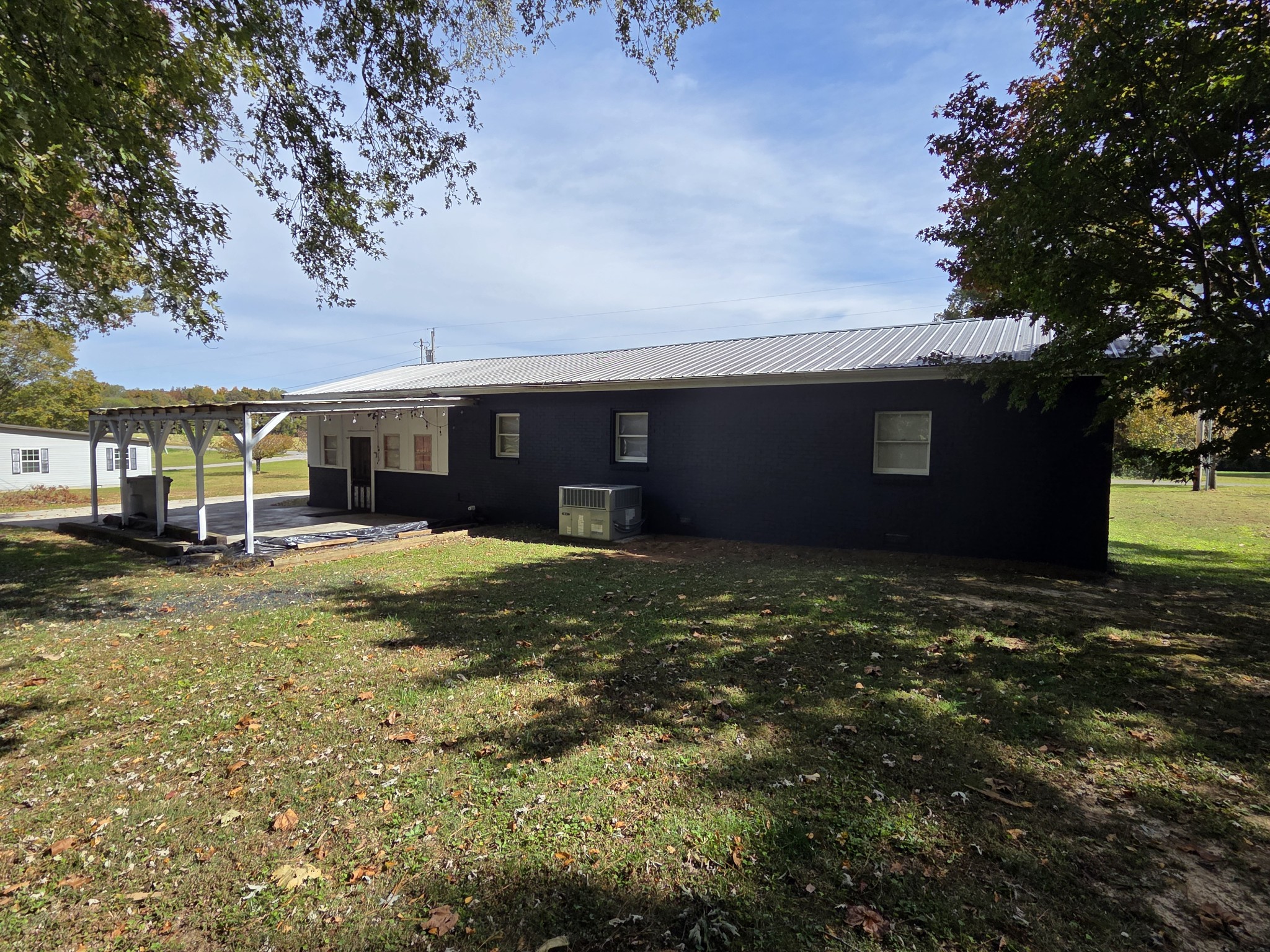 65 Anthony Mill Road Tullahoma, TN 37388 - Photo 9 of 43 a view of a house with a backyard