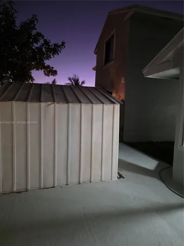 a view of a yard outdoor seating area