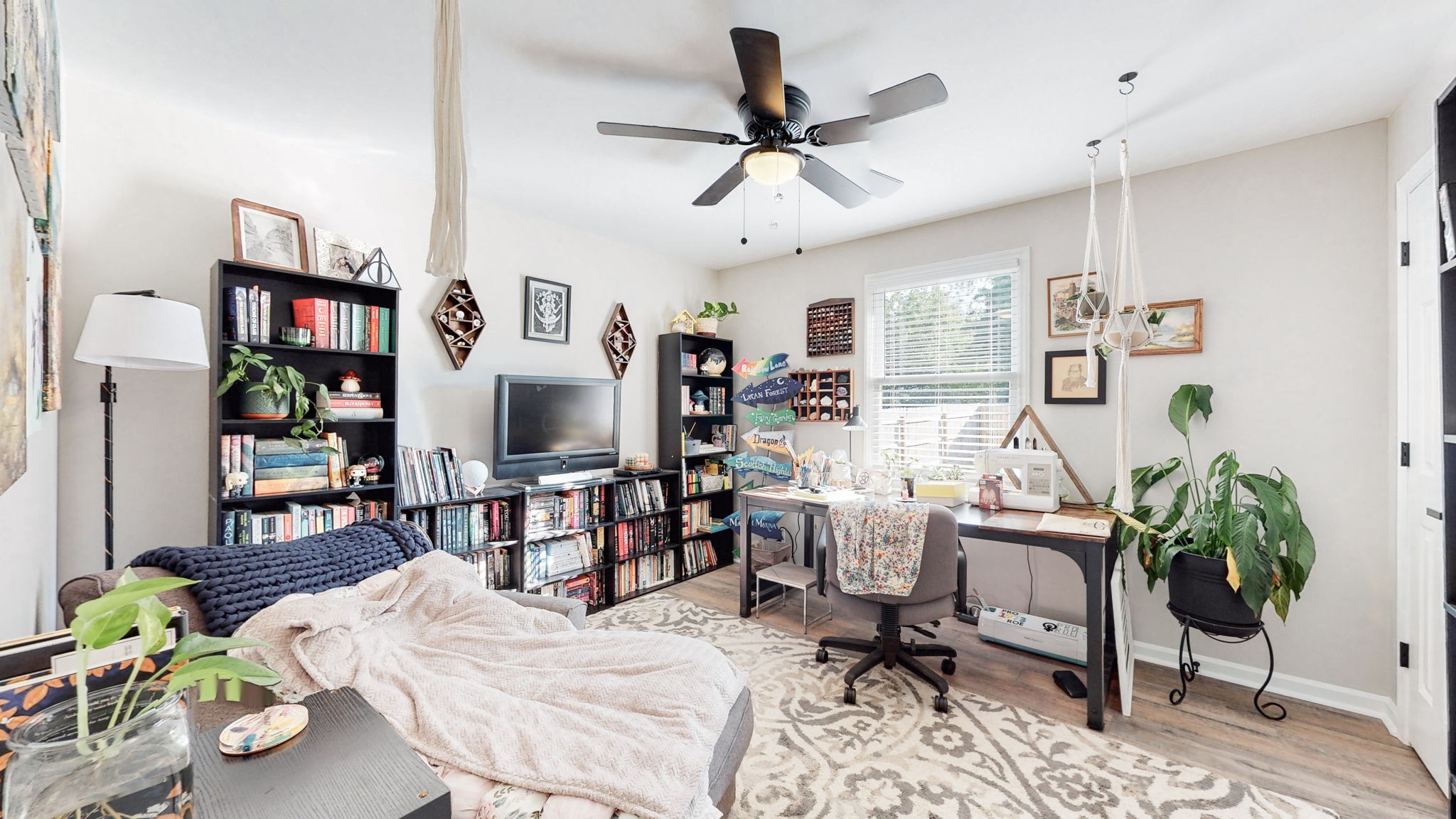 506 Thatcher Trace Murfreesboro, TN 37129 - Photo 13 of 22 a living room with furniture a bookshelf and a window