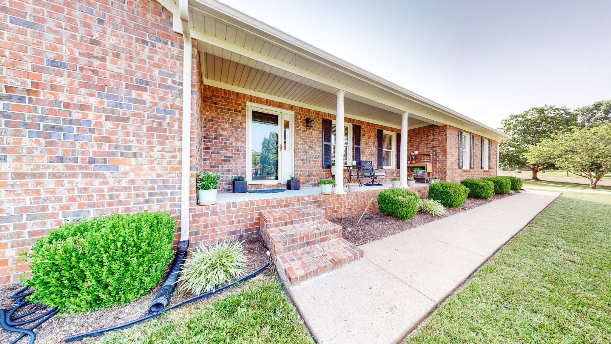 506 Thatcher Trace Murfreesboro, TN 37129 - Photo 2 of 22 a front view of a house with garden and plants