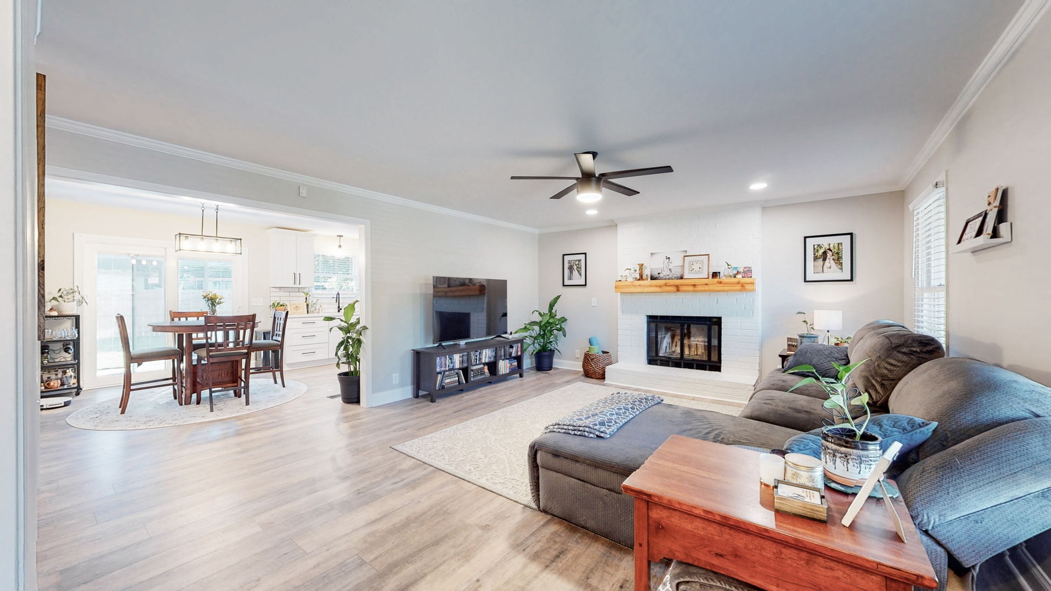 506 Thatcher Trace Murfreesboro, TN 37129 - Photo 4 of 22 a living room with furniture a fireplace and a flat screen tv