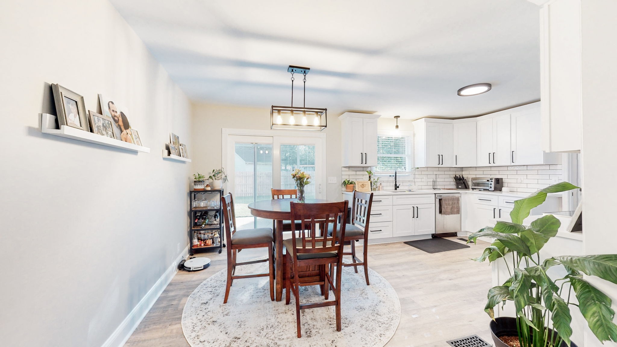 506 Thatcher Trace Murfreesboro, TN 37129 - Photo 6 of 22 a view of a dining room with furniture and a chandelier