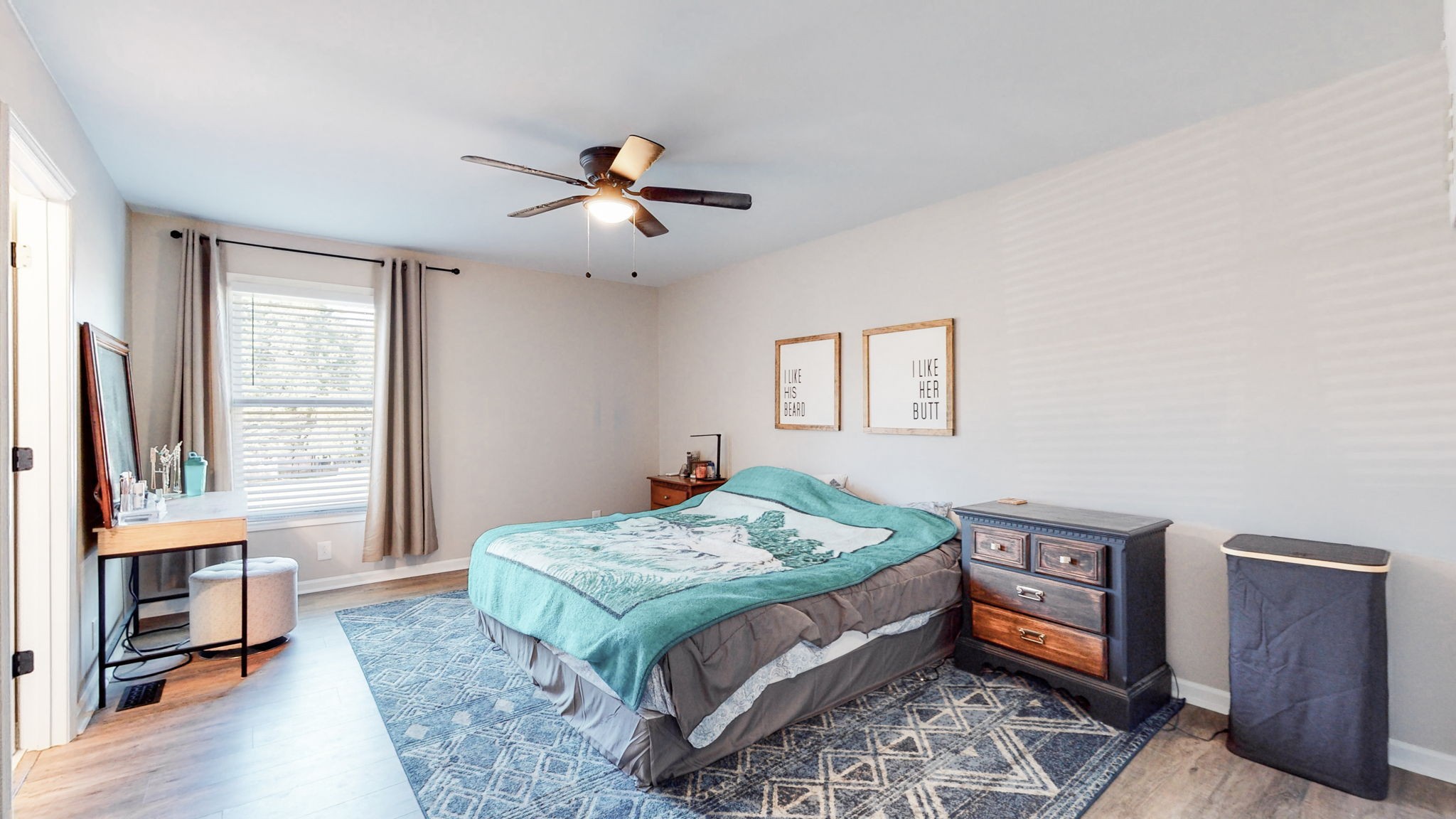 506 Thatcher Trace Murfreesboro, TN 37129 - Photo 10 of 22 a bedroom with a bed and wooden floor