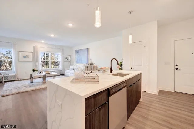 a en suite bathroom with a sink and a mirror