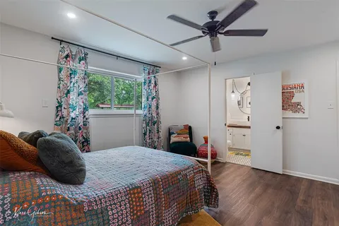 a bed room with a bed and a couch