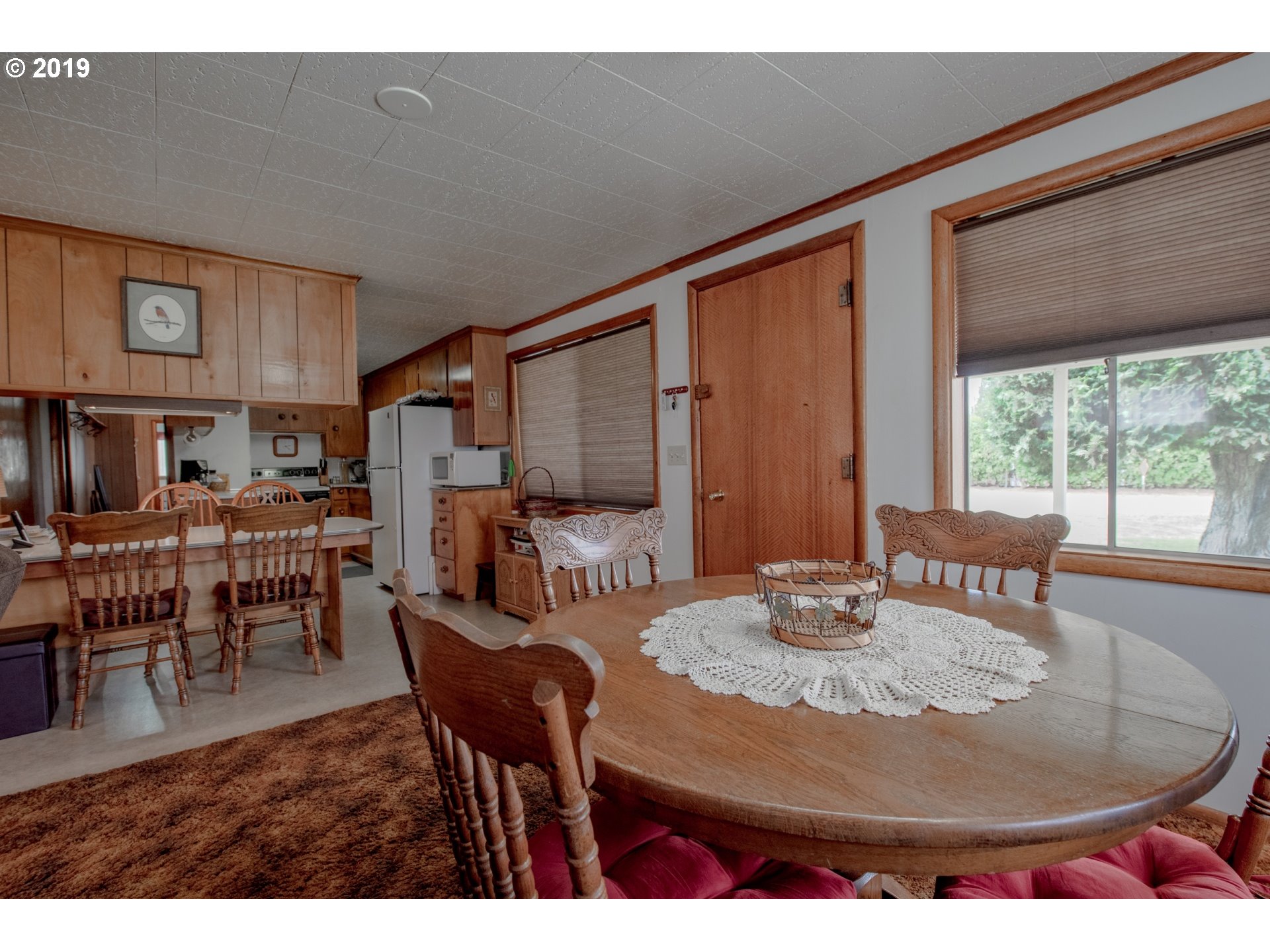 1285 Tucker Road Hood River, OR 97031 - Photo 13 of 32 a view of a dining room with furniture window and outside view