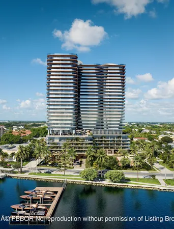 a view of a lake with a large building