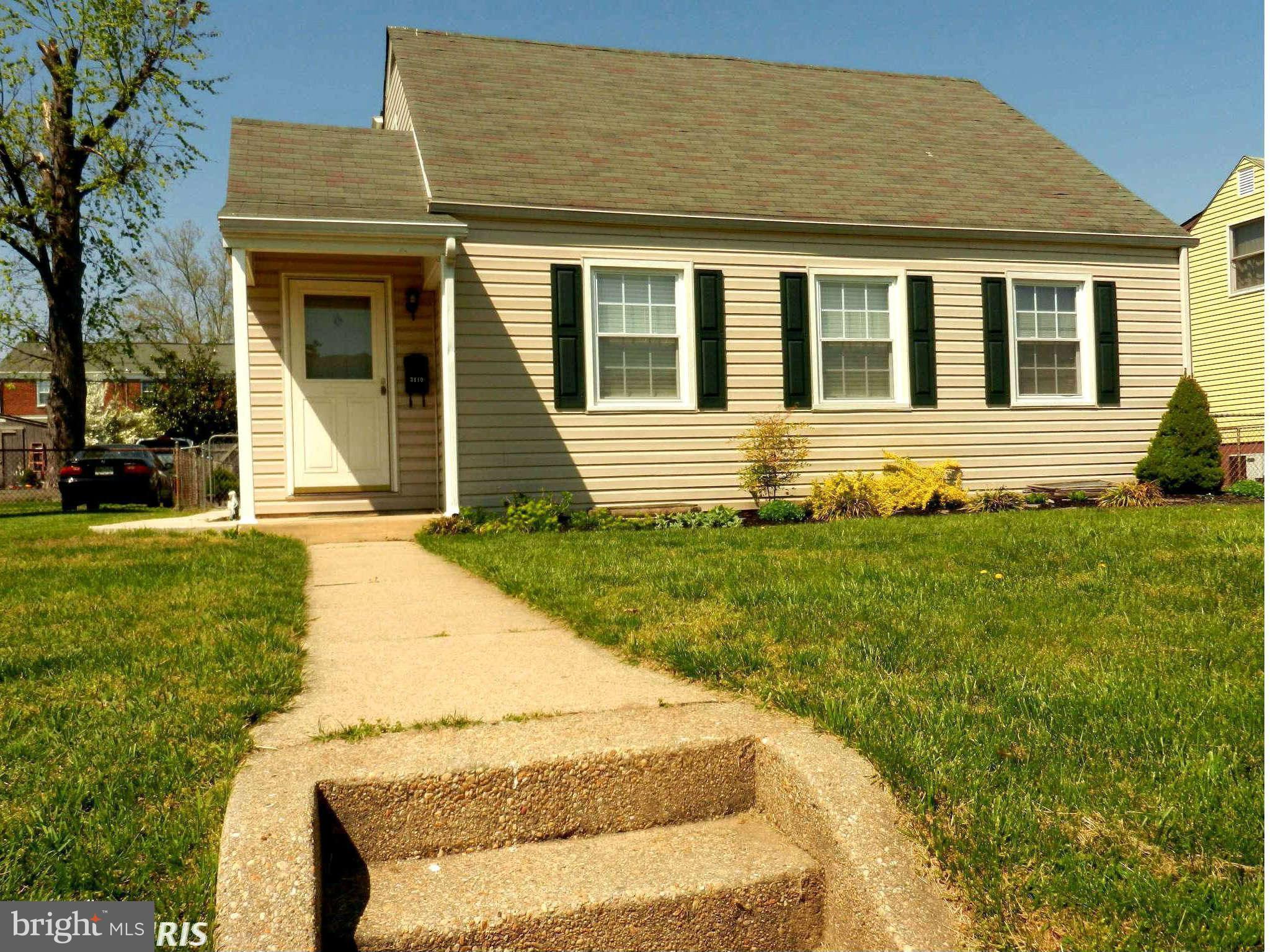 3110 Cornwall Road Baltimore, MD 21222 - Photo 1 of 28 a front view of a house with a yard