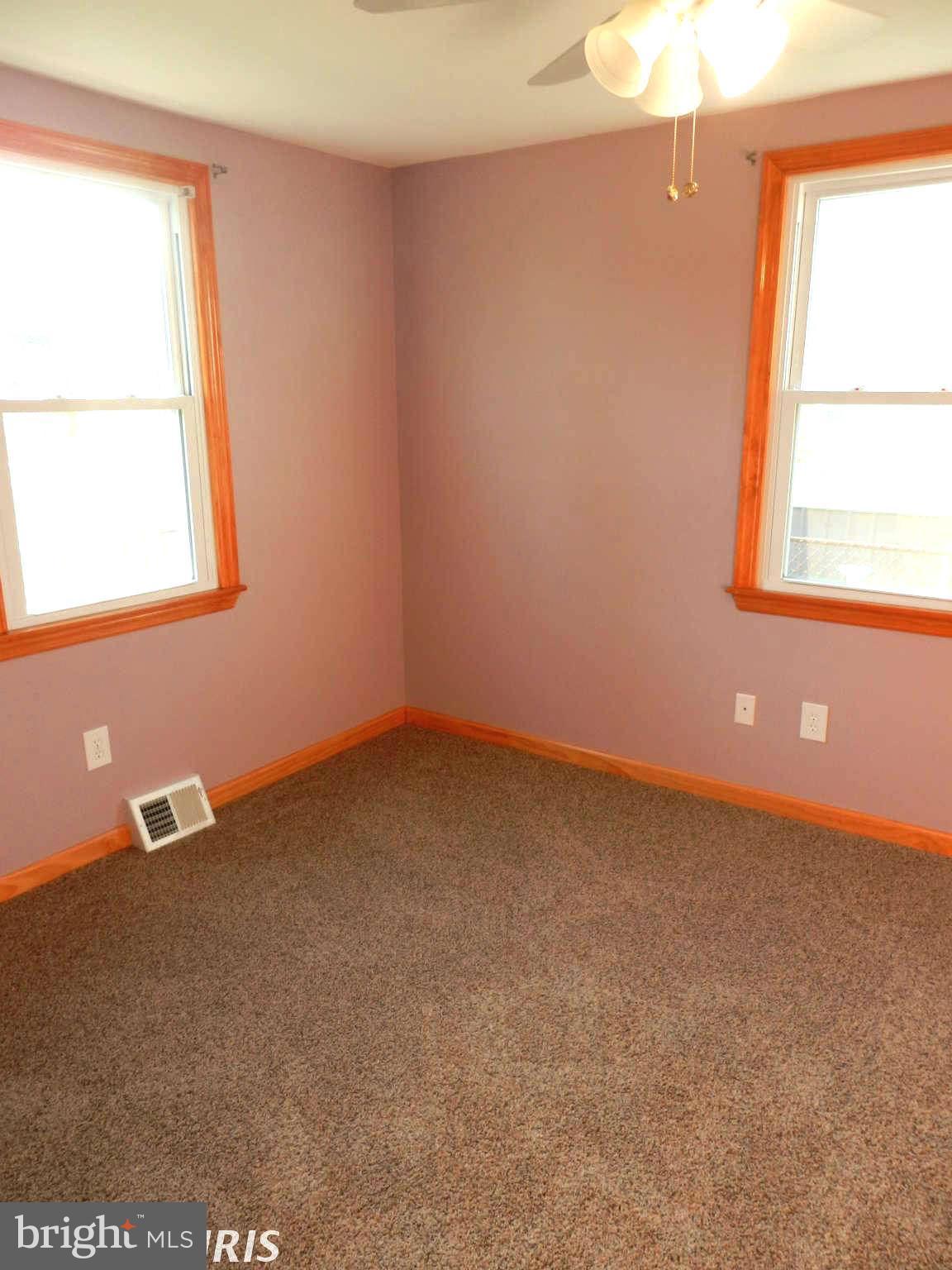 3110 Cornwall Road Baltimore, MD 21222 - Photo 18 of 28 an empty room with a window
