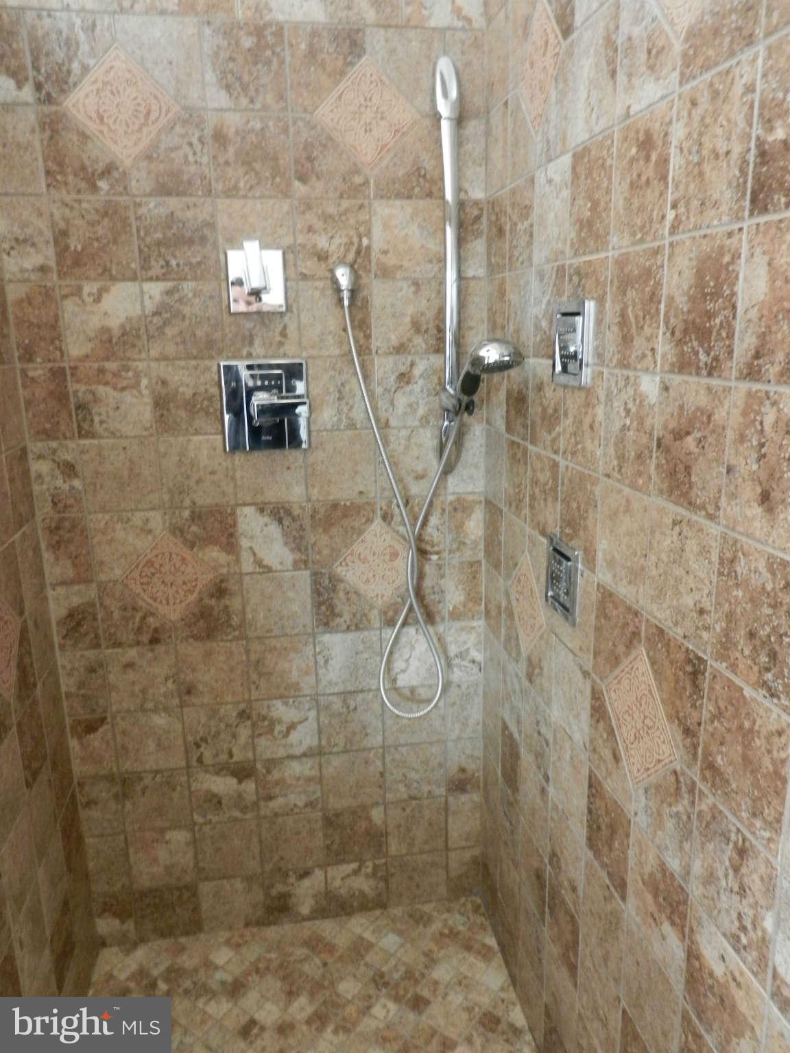3110 Cornwall Road Baltimore, MD 21222 - Photo 7 of 28 a bathroom with a shower