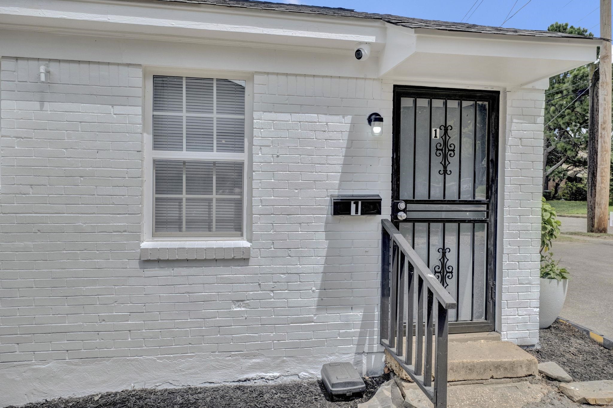 2966 Yale Avenue, Unit 3 Memphis, TN 38112 - Photo 1 of 24 Doorway to property with brick siding
