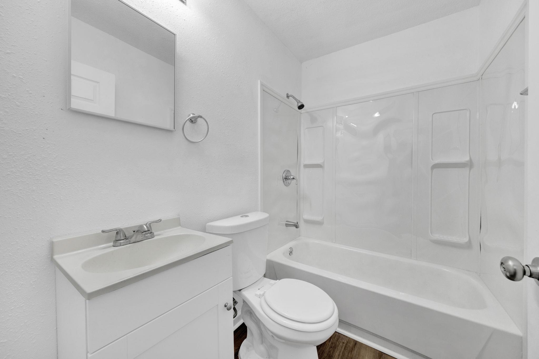 2966 Yale Avenue, Unit 3 Memphis, TN 38112 - Photo 16 of 24 Full bath featuring shower / bathtub combination, vanity, and a textured wall