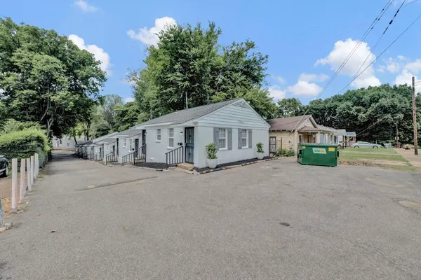 a view of house with outdoor space and street view