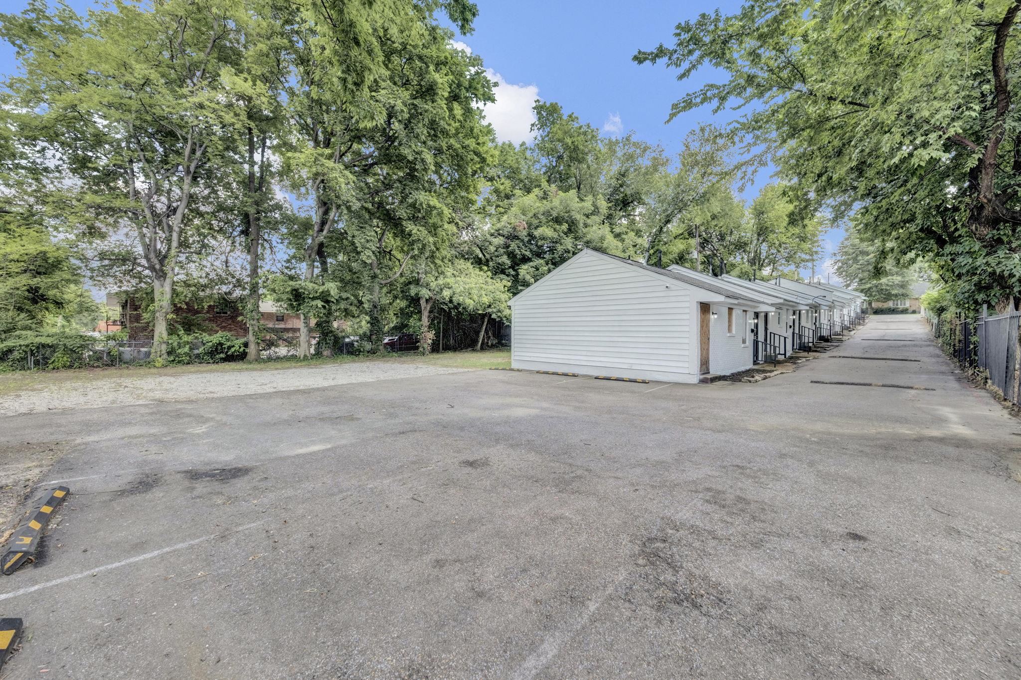 2966 Yale Avenue, Unit 3 Memphis, TN 38112 - Photo 20 of 24 Garage with view of scattered trees