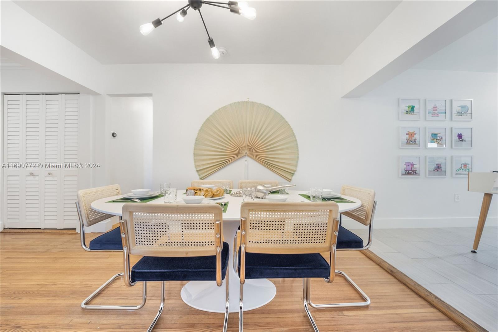 320 Southwest 24th Road Miami, FL 33129 - Photo 15 of 27 a workspace with furniture and wooden floor