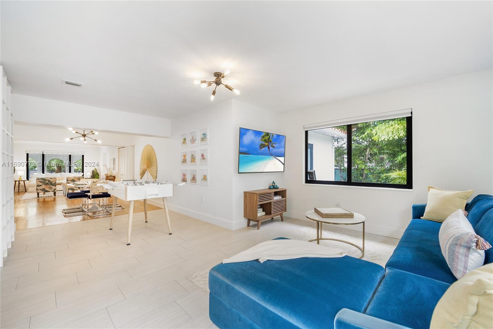 320 Southwest 24th Road Miami, FL 33129 - Photo 19 of 27 a living room with furniture and wooden floor