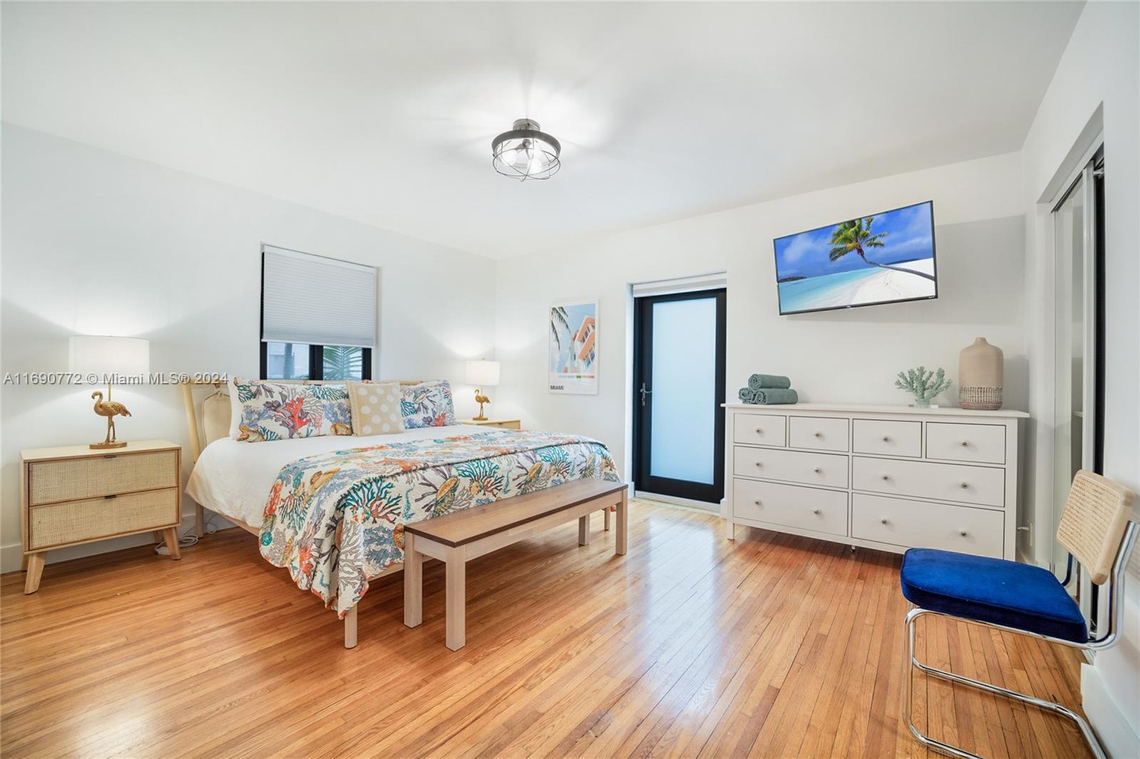 320 Southwest 24th Road Miami, FL 33129 - Photo 20 of 27 a bedroom with a bed and a dresser
