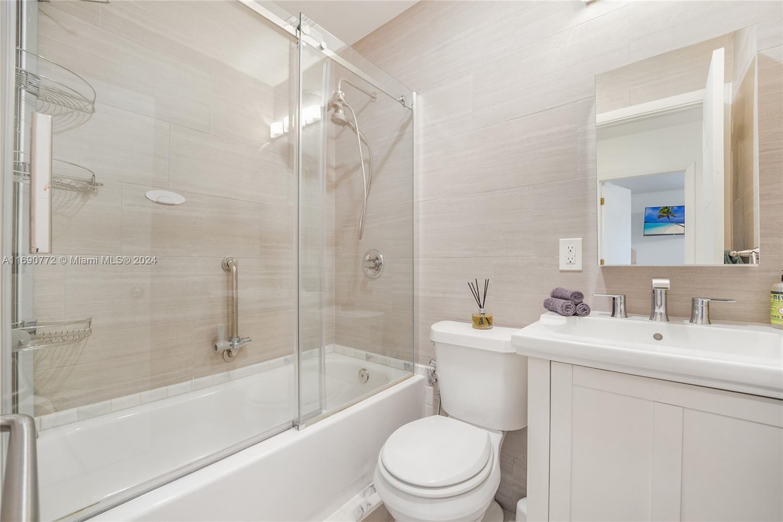 320 Southwest 24th Road Miami, FL 33129 - Photo 22 of 27 a bathroom with a sink toilet and shower