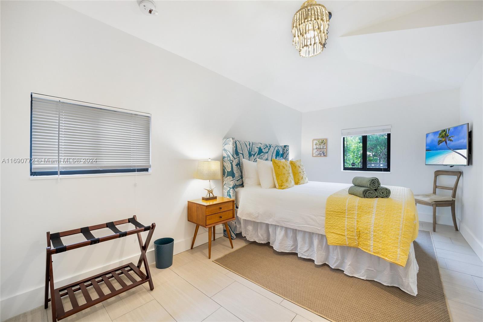 320 Southwest 24th Road Miami, FL 33129 - Photo 23 of 27 a bedroom with bed and window