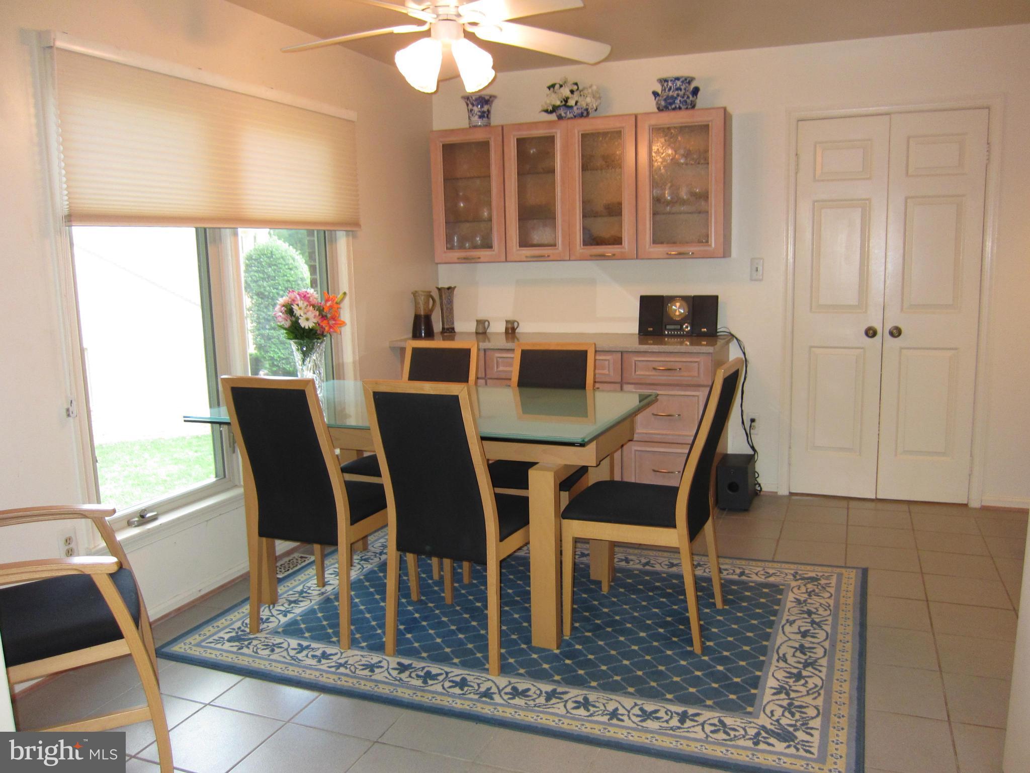 15212 Winstead Lane Silver Spring, MD 20905 - Photo 11 of 30 Kitchen eat-in area with built-in cabinetry