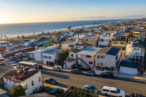 an aerial view of a building with outdoor space