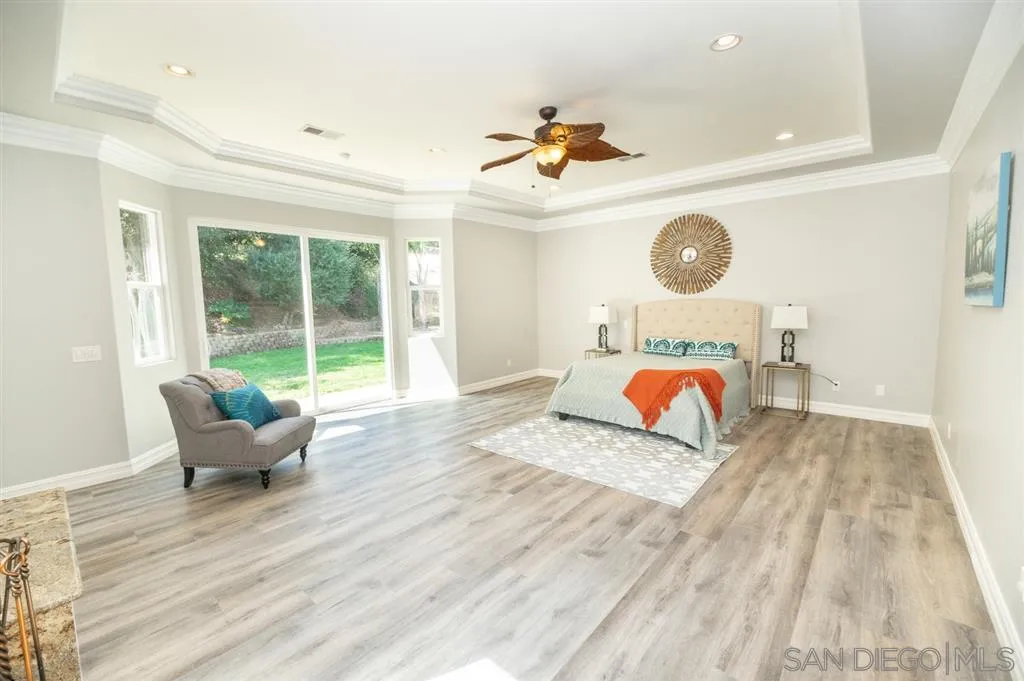 12841 Stone Canyon Road Poway, CA 92064 - Photo 11 of 25 a living room with furniture and a large window