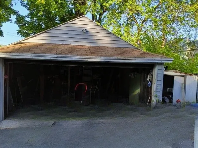 a front view of a house with yard