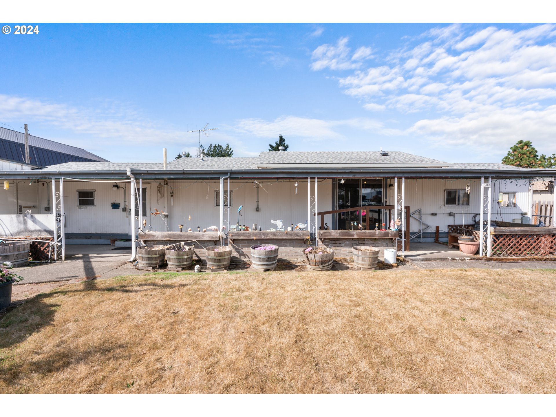 300 Ridings Avenue Molalla, OR 97038 - Photo 1 of 36 a view of house with yard and sitting area
