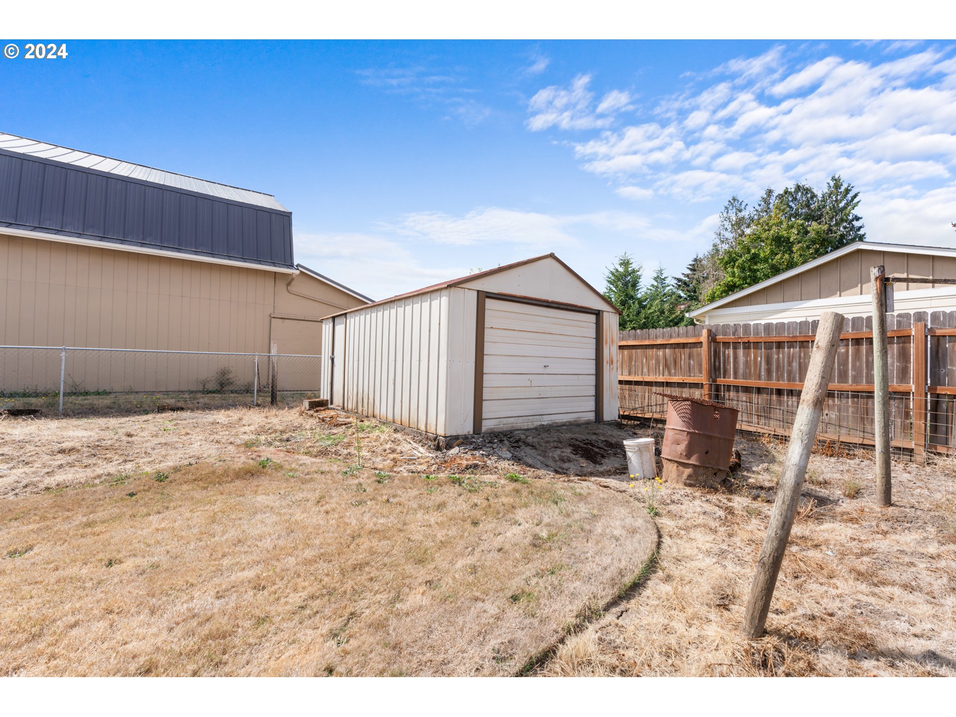 300 Ridings Avenue Molalla, OR 97038 - Photo 19 of 36 a house view with a backyard space