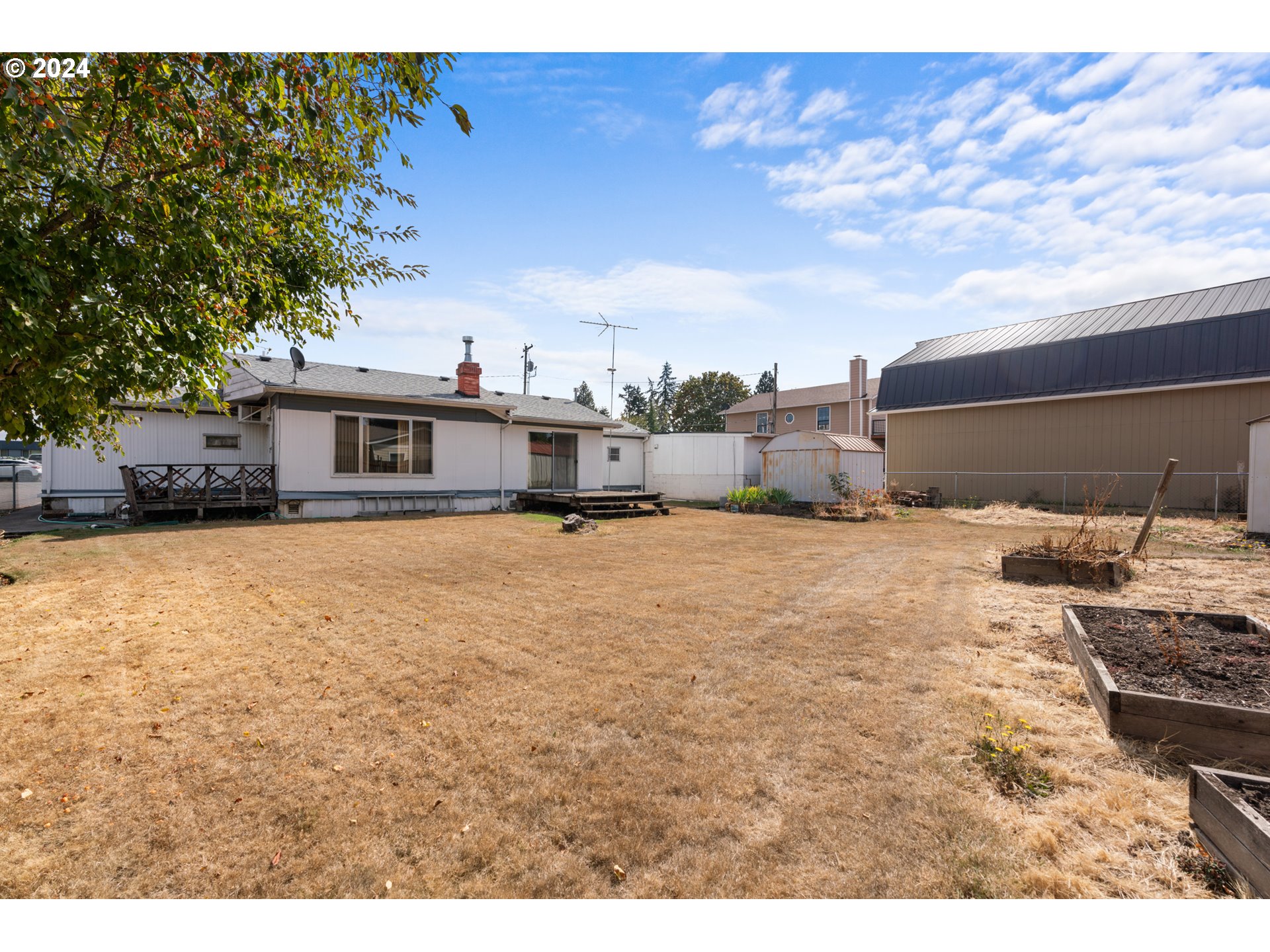 300 Ridings Avenue Molalla, OR 97038 - Photo 25 of 36 a view of a house with a yard