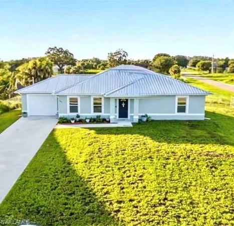 a view of a house with a swimming pool