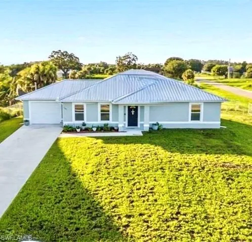 a view of a house with a swimming pool