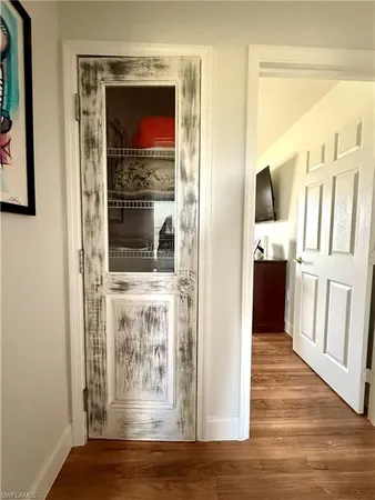 a view of living room with wooden floor