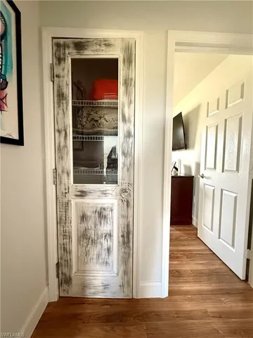 a view of living room with wooden floor