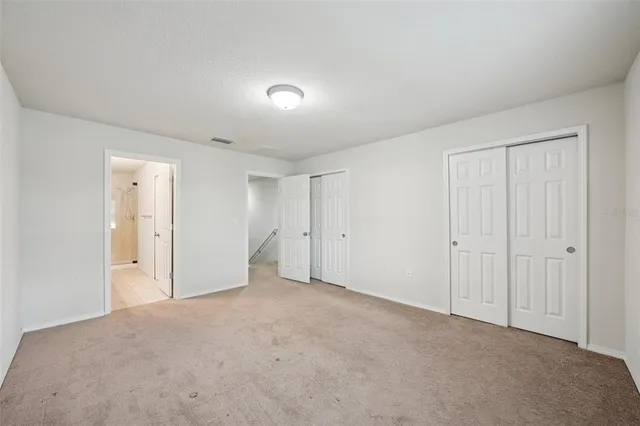 an empty room with a empty space and window