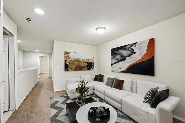 a view of an empty room with a sink