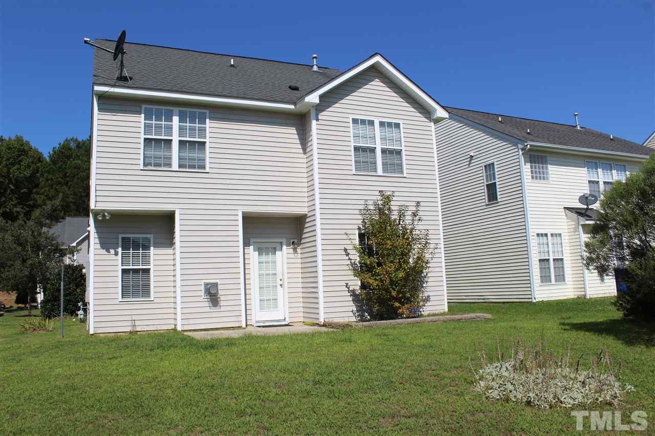 8518 Boysenberry Lane Raleigh, NC 27616 - Photo 2 of 17 a front view of a house with a yard