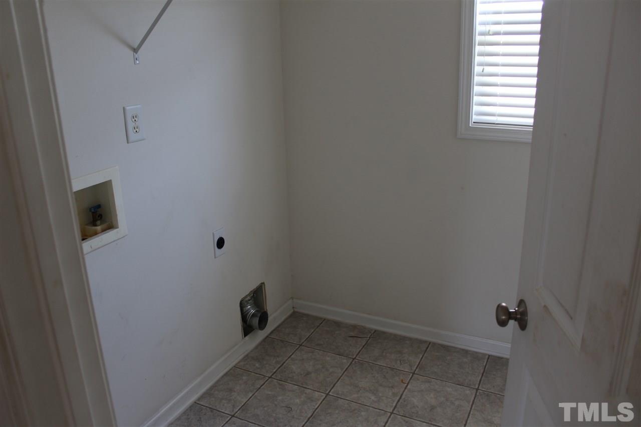 8518 Boysenberry Lane Raleigh, NC 27616 - Photo 9 of 17 a view of a bathroom