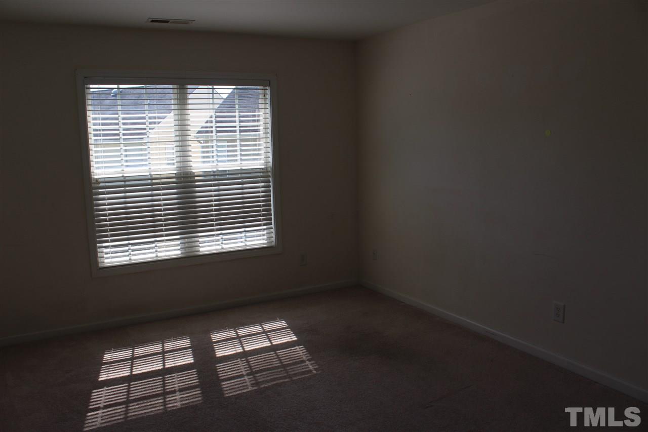 8518 Boysenberry Lane Raleigh, NC 27616 - Photo 10 of 17 a view of small space with windows