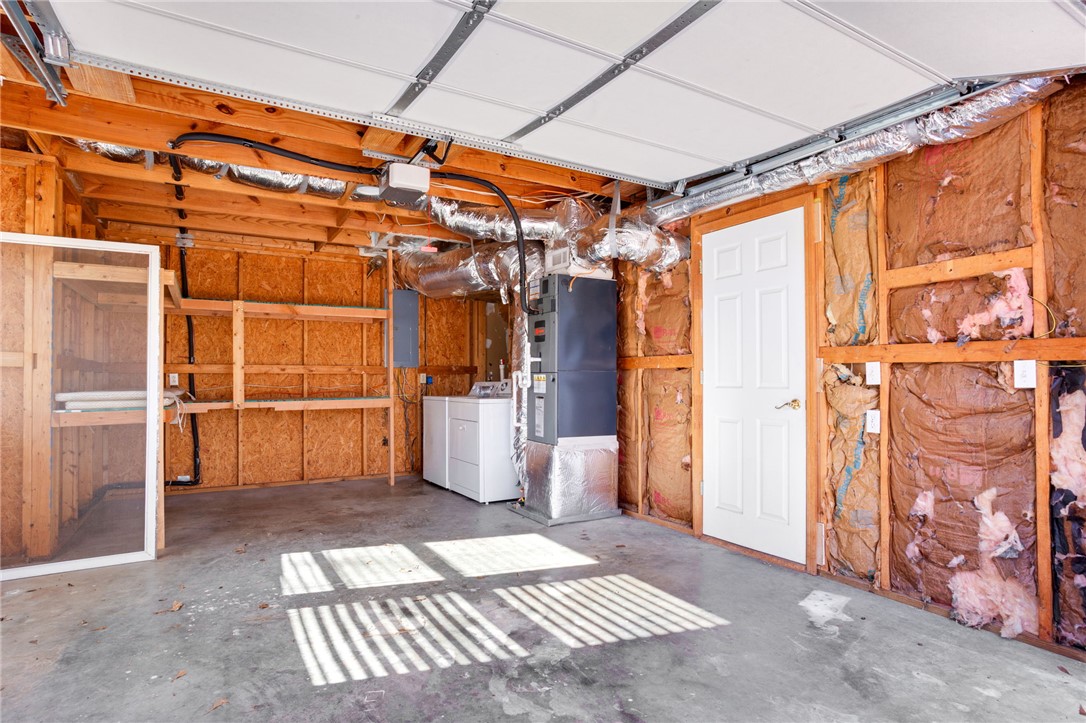 1133 Elrod Ferry Road Hartwell, GA 30643 - Photo 38 of 46 This spacious garage offers ample storage and direct access to essential utilities.