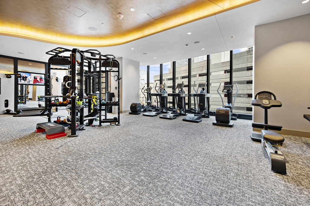 1 Franklin Street, Unit 1002 Boston, MA 02110 - Photo 12 of 21 a view of a room with gym equipment
