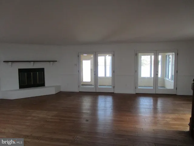 a kitchen with stainless steel appliances a sink stove and microwave