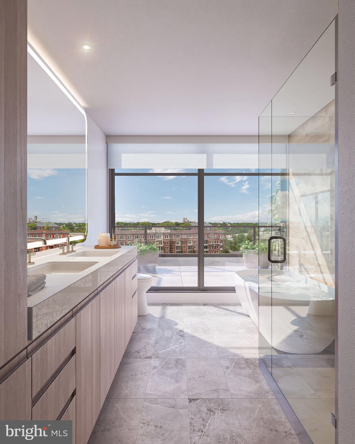 2650 Woodley Road Northwest, Unit 704/VARIES Washington, DC 20008 - Photo 25 of 36 a bathroom with a large tub and sink