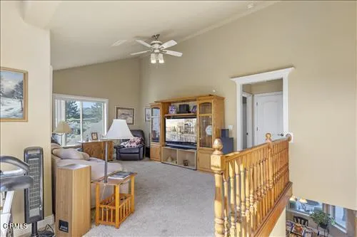 a living room with furniture and window