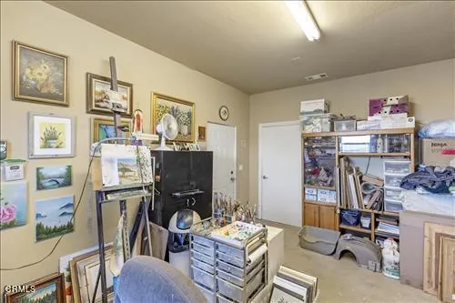 a view of a pathway of a house with a yard